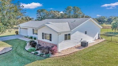 Fabulous, updated 2-bedroom 2 bath Palm model on the Golf Course on The Links of Spruce Creek in Florida - for sale on GolfHomes.com, golf home, golf lot
