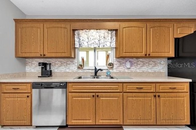 Fabulous, updated 2-bedroom 2 bath Palm model on the Golf Course on The Links of Spruce Creek in Florida - for sale on GolfHomes.com, golf home, golf lot