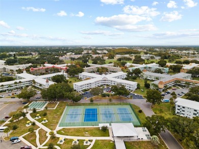 Welcome to your sunlit sanctuary in On Top of the World, a on On Top Of The World Golf Course in Florida - for sale on GolfHomes.com, golf home, golf lot