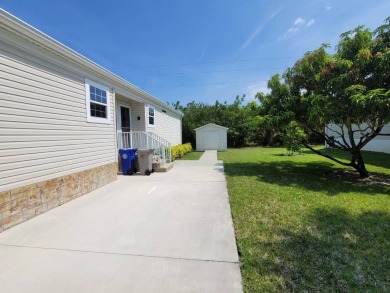 Looking for that big home? This 3/2 home has at least 1700 sq ft on Pelican Pointe 9 Hole Course in Florida - for sale on GolfHomes.com, golf home, golf lot