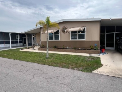 Gorgeous totally remodeled home!!  1,100 Sq Ft.  Addition 3rd on Six Lakes Country Club in Florida - for sale on GolfHomes.com, golf home, golf lot