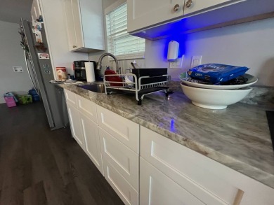 Gorgeous totally remodeled home!!  1,100 Sq Ft.  Addition 3rd on Six Lakes Country Club in Florida - for sale on GolfHomes.com, golf home, golf lot