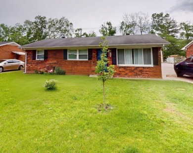 Walk into the comfort of home in this cozy, brick house located on Griffin Gate Golf Resort in Kentucky - for sale on GolfHomes.com, golf home, golf lot