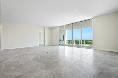 Floor-to-ceiling glass wraps this SouthEast corner penthouse on Boca Raton Resort and Club in Florida - for sale on GolfHomes.com, golf home, golf lot