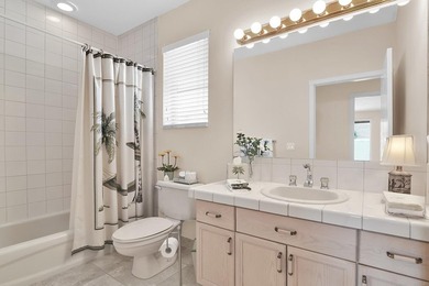 GATED COMMUNITY Pine Tree Golf Club living in this 4BR/3BA on Pine Tree Golf Club in Florida - for sale on GolfHomes.com, golf home, golf lot