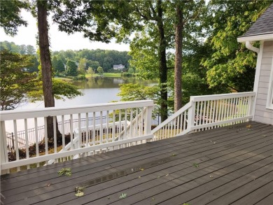 Welcome to this beautiful lakefront home located on a quiet on Brookstone Golf and Country Club in Georgia - for sale on GolfHomes.com, golf home, golf lot