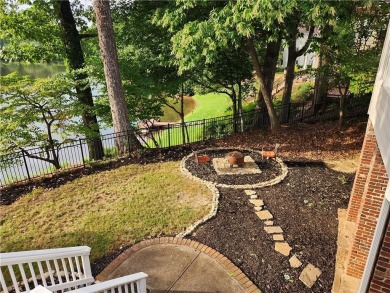 Welcome to this beautiful lakefront home located on a quiet on Brookstone Golf and Country Club in Georgia - for sale on GolfHomes.com, golf home, golf lot