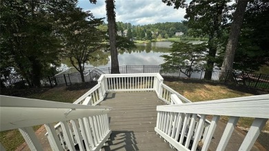 Welcome to this beautiful lakefront home located on a quiet on Brookstone Golf and Country Club in Georgia - for sale on GolfHomes.com, golf home, golf lot