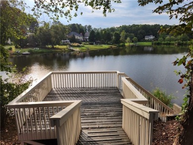 Welcome to this beautiful lakefront home located on a quiet on Brookstone Golf and Country Club in Georgia - for sale on GolfHomes.com, golf home, golf lot