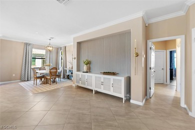 This beautiful second-floor, western-exposure condo offers over on Gateway Golf and Country Club in Florida - for sale on GolfHomes.com, golf home, golf lot