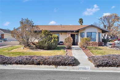 Welcome to this charming 3-bedroom, 2-bathroom corner-lot home on Spring Valley Lake Country Club in California - for sale on GolfHomes.com, golf home, golf lot