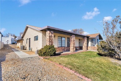 Welcome to this charming 3-bedroom, 2-bathroom corner-lot home on Spring Valley Lake Country Club in California - for sale on GolfHomes.com, golf home, golf lot