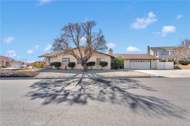 Welcome to this charming 3-bedroom, 2-bathroom corner-lot home on Spring Valley Lake Country Club in California - for sale on GolfHomes.com, golf home, golf lot