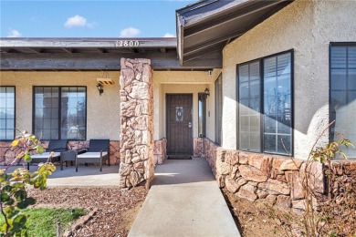 Welcome to this charming 3-bedroom, 2-bathroom corner-lot home on Spring Valley Lake Country Club in California - for sale on GolfHomes.com, golf home, golf lot