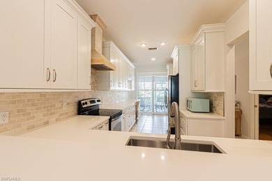 Welcome to this beautifully maintained 2-bedroom + den residence on Arrowhead Golf Club At Heritage Greens in Florida - for sale on GolfHomes.com, golf home, golf lot