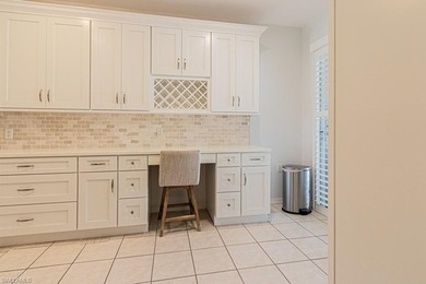 Welcome to this beautifully maintained 2-bedroom + den residence on Arrowhead Golf Club At Heritage Greens in Florida - for sale on GolfHomes.com, golf home, golf lot