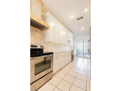 Welcome to this beautifully maintained 2-bedroom + den residence on Arrowhead Golf Club At Heritage Greens in Florida - for sale on GolfHomes.com, golf home, golf lot