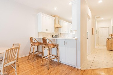 Welcome to this beautifully maintained 2-bedroom + den residence on Arrowhead Golf Club At Heritage Greens in Florida - for sale on GolfHomes.com, golf home, golf lot