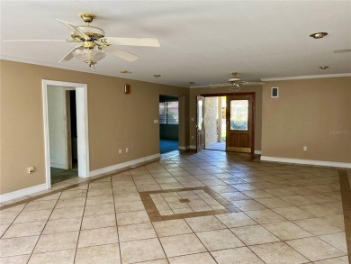 The property flooded twice last year and is being sold as its on Pasadena Yacht and Country Club in Florida - for sale on GolfHomes.com, golf home, golf lot