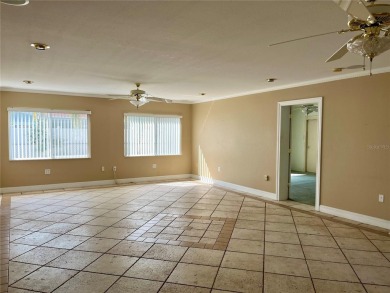 The property flooded twice last year and is being sold as its on Pasadena Yacht and Country Club in Florida - for sale on GolfHomes.com, golf home, golf lot