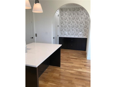 This stunning triplex is located in the heart of town, offering on Pinnacle Country Club in Arkansas - for sale on GolfHomes.com, golf home, golf lot