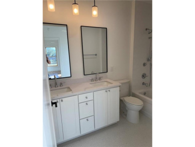 This stunning triplex is located in the heart of town, offering on Pinnacle Country Club in Arkansas - for sale on GolfHomes.com, golf home, golf lot