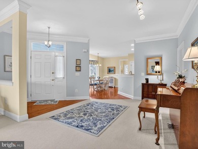 Welcome to this end-unit villa in the coveted, gated Regency at on Regency At Dominion Valley Country Club in Virginia - for sale on GolfHomes.com, golf home, golf lot