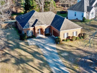 Welcome to this charming home in the desirable Lake Down North on Canongate At Georgia National Golf Club in Georgia - for sale on GolfHomes.com, golf home, golf lot