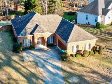 Welcome to this charming home in the desirable Lake Down North on Canongate At Georgia National Golf Club in Georgia - for sale on GolfHomes.com, golf home, golf lot