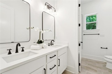 Beautifully appointed home on an expansive lot, offering on Money Hill Golf and Country Club in Louisiana - for sale on GolfHomes.com, golf home, golf lot