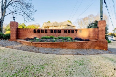 Welcome to this charming home in the desirable Lake Down North on Canongate At Georgia National Golf Club in Georgia - for sale on GolfHomes.com, golf home, golf lot