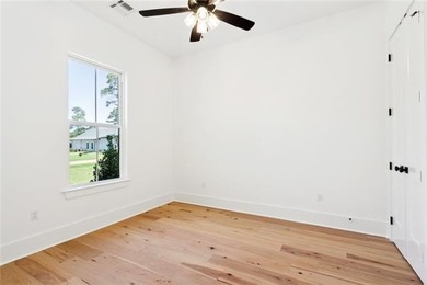 Beautifully appointed home on an expansive lot, offering on Money Hill Golf and Country Club in Louisiana - for sale on GolfHomes.com, golf home, golf lot