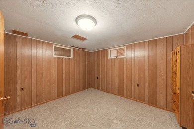 Just steps away from a large community park featuring a tennis on Headwaters Golf Course in Montana - for sale on GolfHomes.com, golf home, golf lot