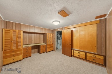 Just steps away from a large community park featuring a tennis on Headwaters Golf Course in Montana - for sale on GolfHomes.com, golf home, golf lot
