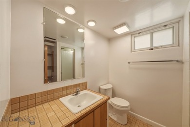 Just steps away from a large community park featuring a tennis on Headwaters Golf Course in Montana - for sale on GolfHomes.com, golf home, golf lot