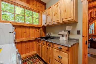 Discover mountain living at its finest with this timeless timber on The Cliffs at Glassy Golf and Country Club in South Carolina - for sale on GolfHomes.com, golf home, golf lot