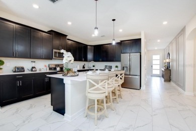 Come see this Beautiful and well-maintained home. Enjoy all the on ChampionsGate Golf Resort in Florida - for sale on GolfHomes.com, golf home, golf lot