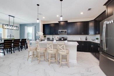Come see this Beautiful and well-maintained home. Enjoy all the on ChampionsGate Golf Resort in Florida - for sale on GolfHomes.com, golf home, golf lot