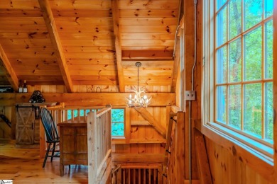 Discover mountain living at its finest with this timeless timber on The Cliffs at Glassy Golf and Country Club in South Carolina - for sale on GolfHomes.com, golf home, golf lot