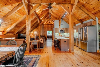 Discover mountain living at its finest with this timeless timber on The Cliffs at Glassy Golf and Country Club in South Carolina - for sale on GolfHomes.com, golf home, golf lot