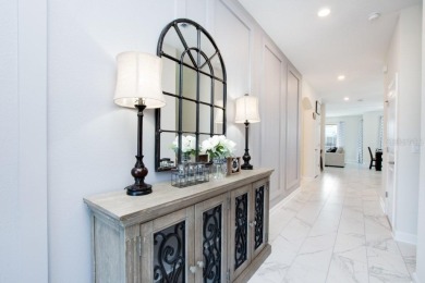 Come see this Beautiful and well-maintained home. Enjoy all the on ChampionsGate Golf Resort in Florida - for sale on GolfHomes.com, golf home, golf lot