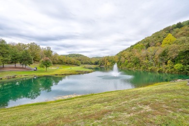 Gorgeous, almost level lot in the prestigious Stonebridge on Ledgestone Country Club and Golf Course in Missouri - for sale on GolfHomes.com, golf home, golf lot