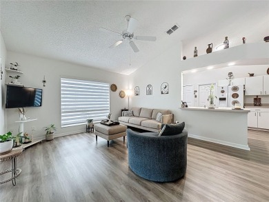 Walk into this modernized Canterbury model located in 55+ gated on Kings Ridge Golf Club in Florida - for sale on GolfHomes.com, golf home, golf lot