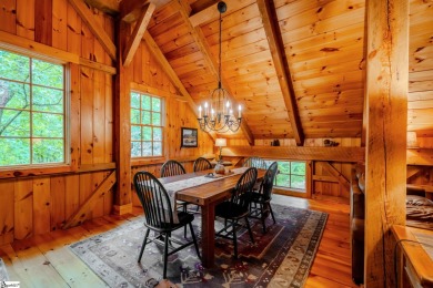 Discover mountain living at its finest with this timeless timber on The Cliffs at Glassy Golf and Country Club in South Carolina - for sale on GolfHomes.com, golf home, golf lot