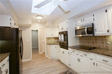 Welcome to this stunning 3-bedroom, 3-bath all-brick home on Woodlake Country Club in North Carolina - for sale on GolfHomes.com, golf home, golf lot