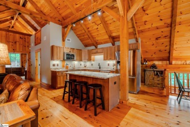 Discover mountain living at its finest with this timeless timber on The Cliffs at Glassy Golf and Country Club in South Carolina - for sale on GolfHomes.com, golf home, golf lot