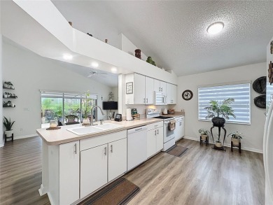 Walk into this modernized Canterbury model located in 55+ gated on Kings Ridge Golf Club in Florida - for sale on GolfHomes.com, golf home, golf lot