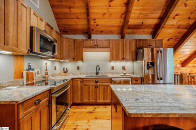 Discover mountain living at its finest with this timeless timber on The Cliffs at Glassy Golf and Country Club in South Carolina - for sale on GolfHomes.com, golf home, golf lot