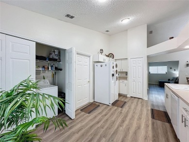 Walk into this modernized Canterbury model located in 55+ gated on Kings Ridge Golf Club in Florida - for sale on GolfHomes.com, golf home, golf lot