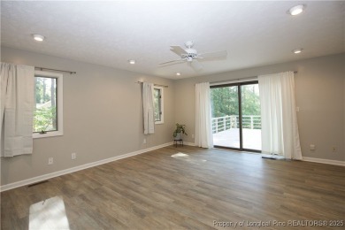 Welcome to this stunning 3-bedroom, 3-bath all-brick home on Woodlake Country Club in North Carolina - for sale on GolfHomes.com, golf home, golf lot
